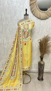 Vibrant Ethnic Charm Muslin Unstitched suit
