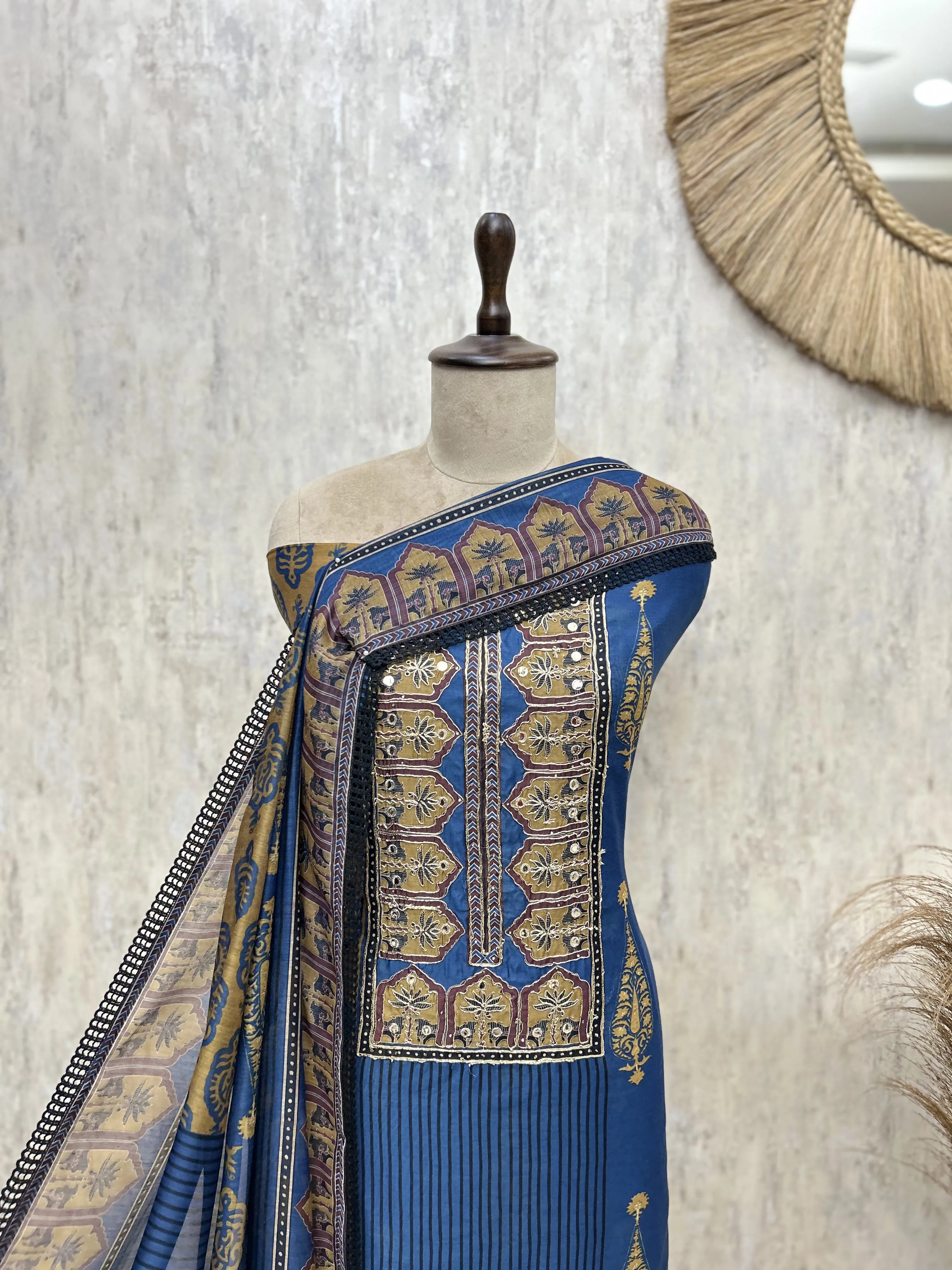 Regal blend of traditional Maheshwari Unstitched Suit